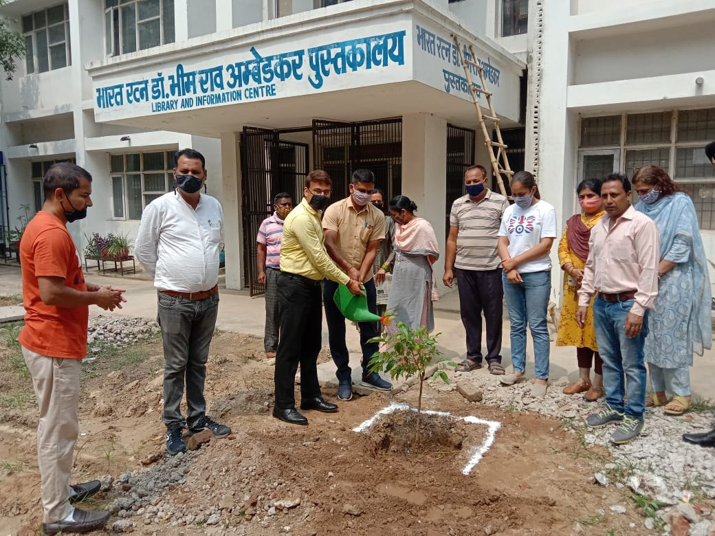AIPRO Manoj Walia and Principal Sanjeev Kumar planting saplings