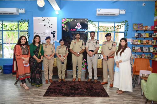 Social worker Ruchi Kaur Bawa with police and administrative officers.