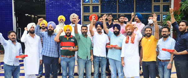 Youth Akali Dal workers celebrating victory