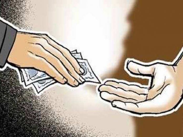 Office Clerk Caught Red Handed Taking Bribe