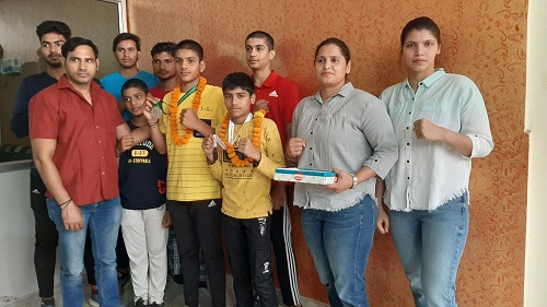 2 children won medals in state boxing