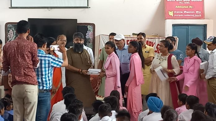 MLA Distributed Tablets to Children