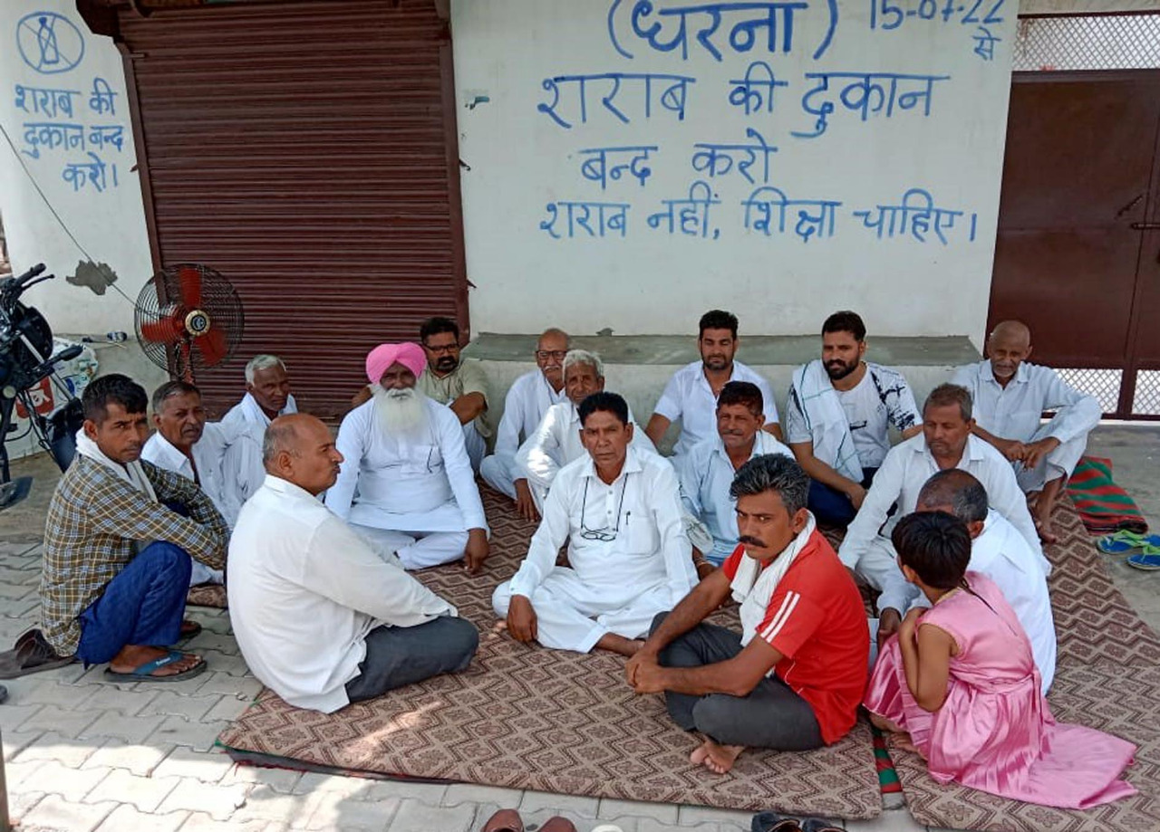 Women Sitting on Dharna to Remove Liquor Shops