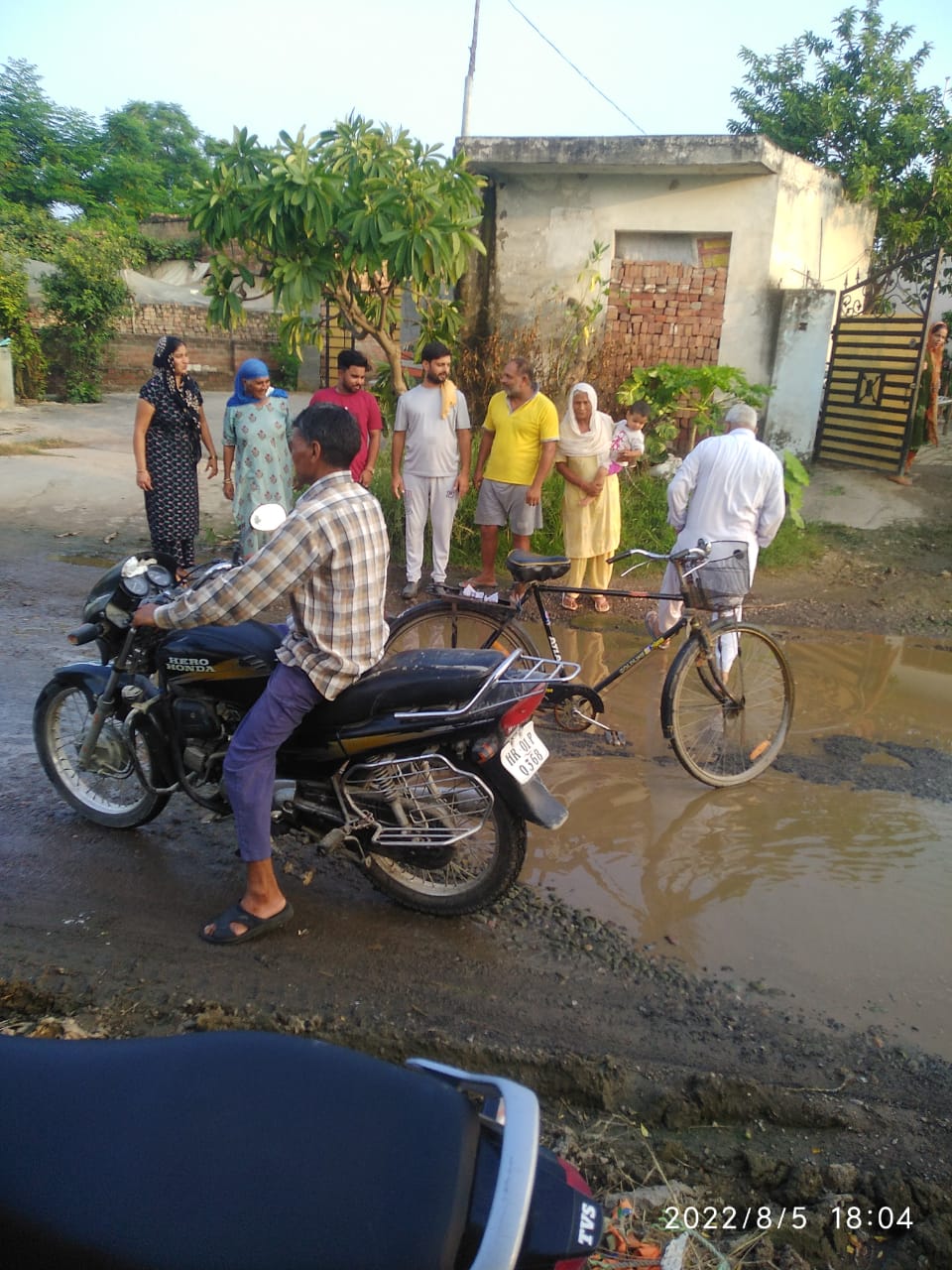 People Upset due to Broken Road