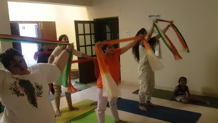 Independence Day Celebrated by Practicing Yoga with Tricolor Dupatta