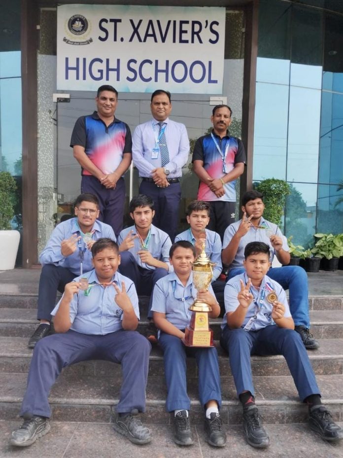 Panipat News/St. Xavier's High School players wave in grappling
