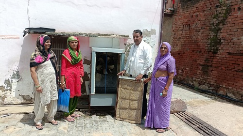 Health workers went door to door and checked dengue larvae