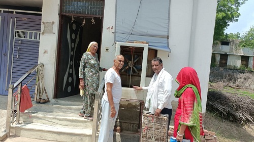 Health workers went door to door and checked dengue larvae