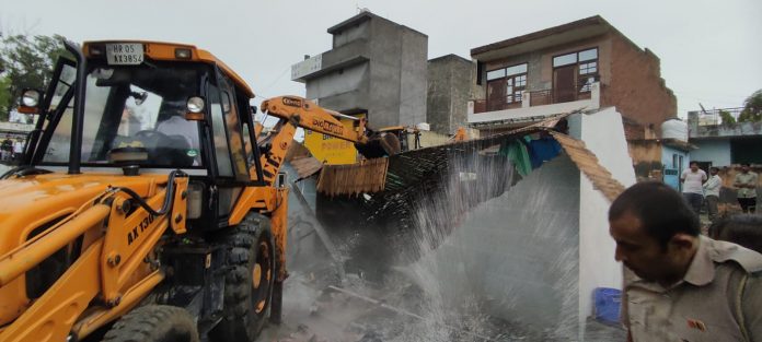 Municipal corporation bulldozer ran on unauthorized 5 star farm house