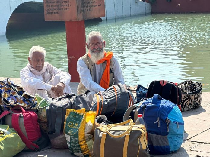 A dip of reverence at Brahmasarovar solar eclipse fair