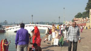 A dip of reverence at Brahmasarovar solar eclipse fair