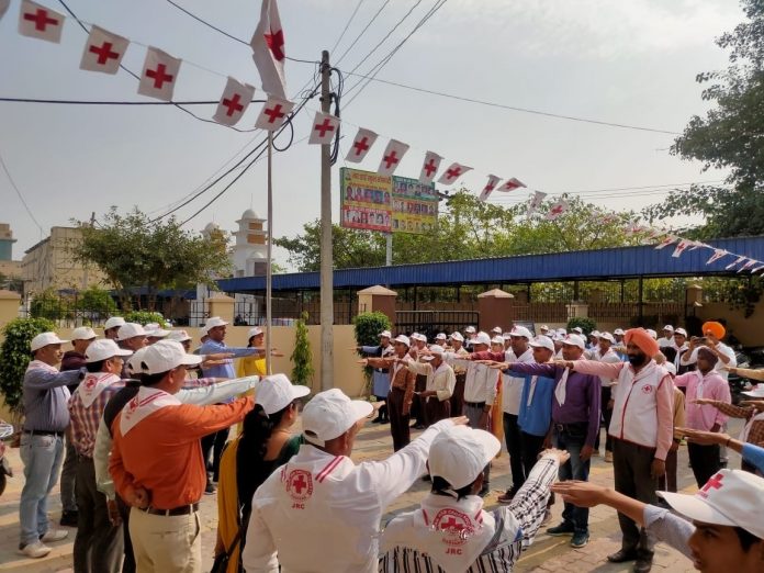 Junior Red Cross participants shout for national service