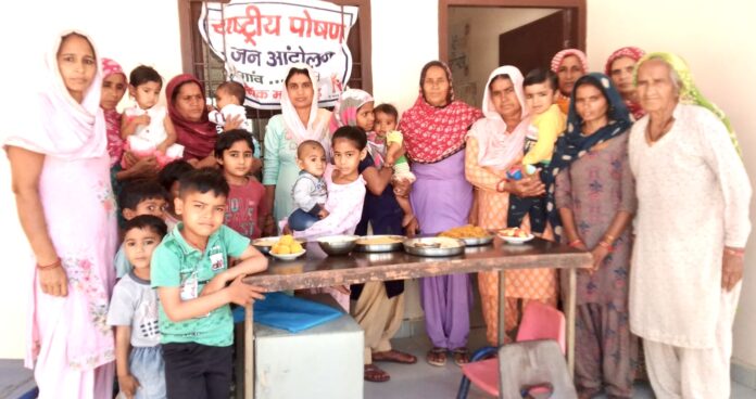 Recipe competition among women in village Dhadhot's Anganwadi center