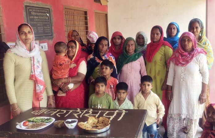 Women made aware by giving information about nutritious diet in Anganwadi center