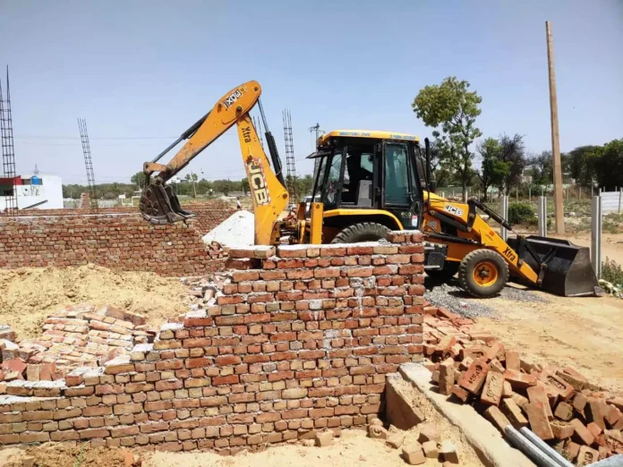 DTP ran a bulldozer on the construction of an illegal colony being developed on nine acres in Suthan
