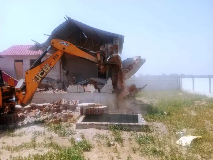 DTP's bulldozer runs on illegal construction on seven acres