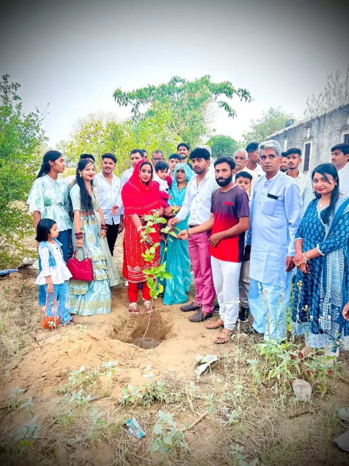 Kuldeep Berla, a member of Team Stand with Nature, planted a fruit tree at a family function