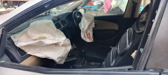 A high speed car lost control after its tyre burst and it collided with the pillar of the flyover