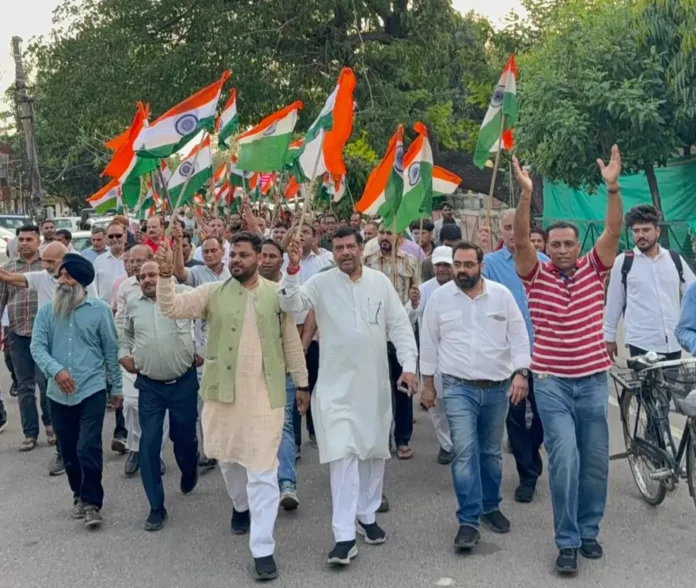 Booth workers took out a tricolor march in sector 15