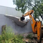 DTP's bulldozer runs on illegal constructions in Masani