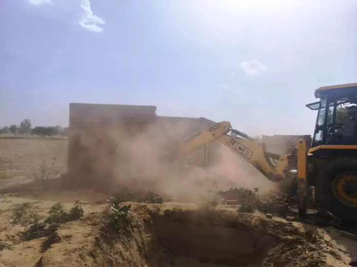 DTP's bulldozer runs on the construction of illegal colony being developed in Natheda