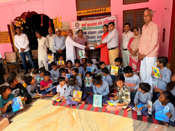 Distribution of textbooks and materials to needy children