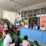 Officials giving information on International Day against Drug Abuse and Illicit Trafficking