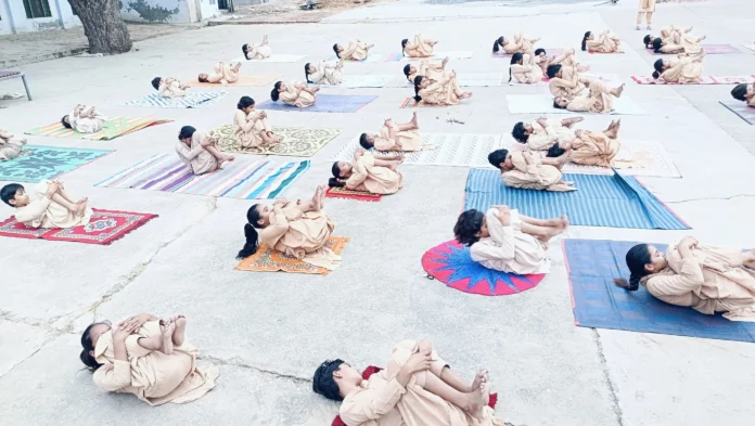 The students of Kanya Gurukul rehearsed the preparations for Yoga Day
