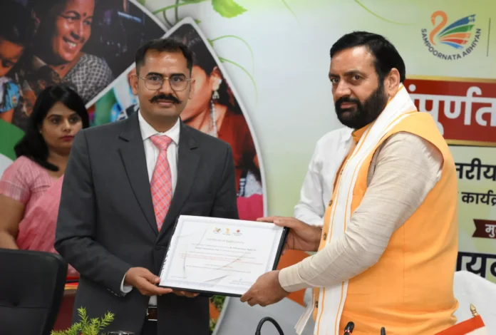 CM Naib Singh Saini honored DC Nuh Vishram Kumar Meena