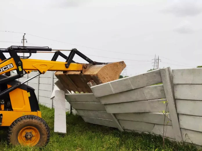 DTP ran a bulldozer on the construction of an illegal colony being developed on four acres