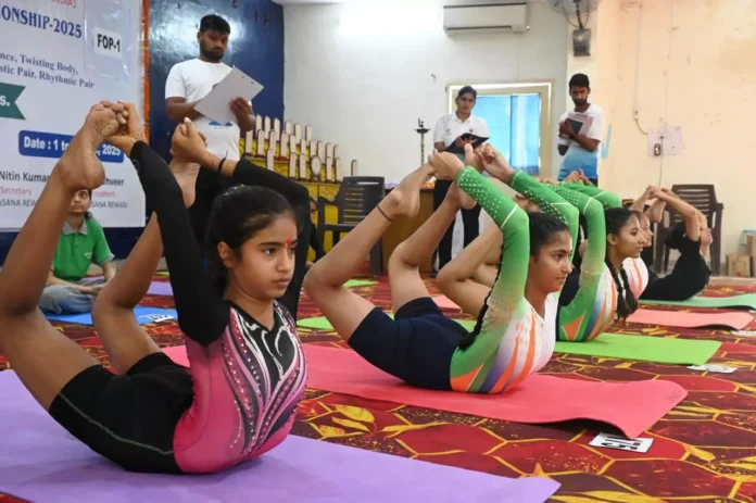 Players showed their strength in the fifth district level yoga sports competition
