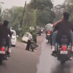 Viral Video: चलती बाइक पर कपल का फिल्मी रोमांस, वायरल वीडियो से हंगामा