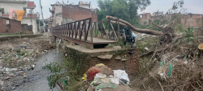 Drain water has become a problem in Kathgarh village, flow is obstructed due to illegal construction, water enters the houses every rainy season, villagers expressed their anger,