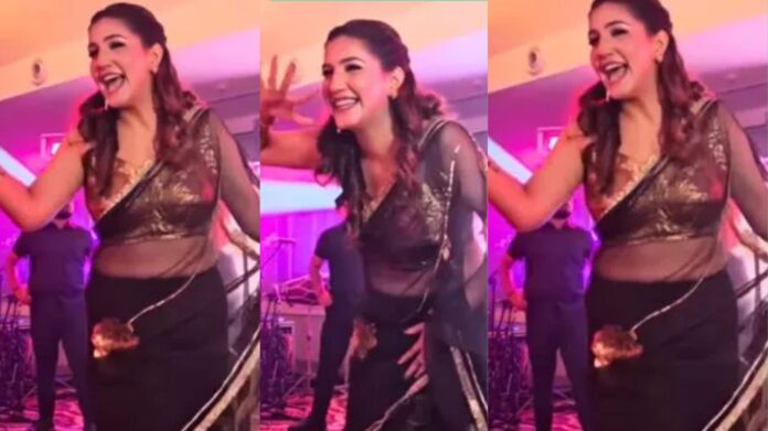 Sapna Choudhary Dance: ट्रांसपेरेंट साड़ी में सपना चौधरी ने मारा ऐसा ठुमका कि इंटरनेट पर मच गया बवाल, फैंस बोले- “देसी क्वीन की कोई बराबरी नहीं!” 