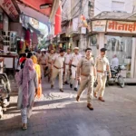 Jind News : जिला पुलिस ने सभी उपमंडलों में निकाला फ्लैग मार्च