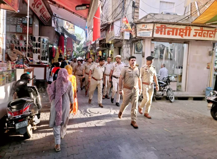 Jind News : जिला पुलिस ने सभी उपमंडलों में निकाला फ्लैग मार्च