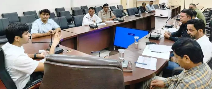 Deputy Commissioner Abhishek Meena holding a meeting of concerned officials regarding illegal colonies.