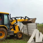 The yellow paw came into action against the construction of an illegal colony being developed on three acres.
