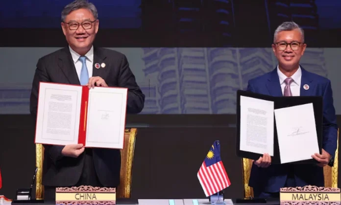 Kuala Lumpur ASEAN Summit: यूएस टैरिफ घटाने के लिए चीन-आसियान के बीच एफटीए पर समझौता Kuala Lumpur ASEAN Summit