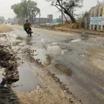 Leakage of canal water has created deep potholes on Road 334B, increasing the problems of two-wheeler riders.