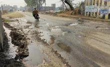 Leakage of canal water has created deep potholes on Road 334B, increasing the problems of two-wheeler riders.